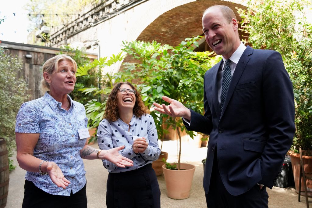 Prince William laughs with guests at Homewards event