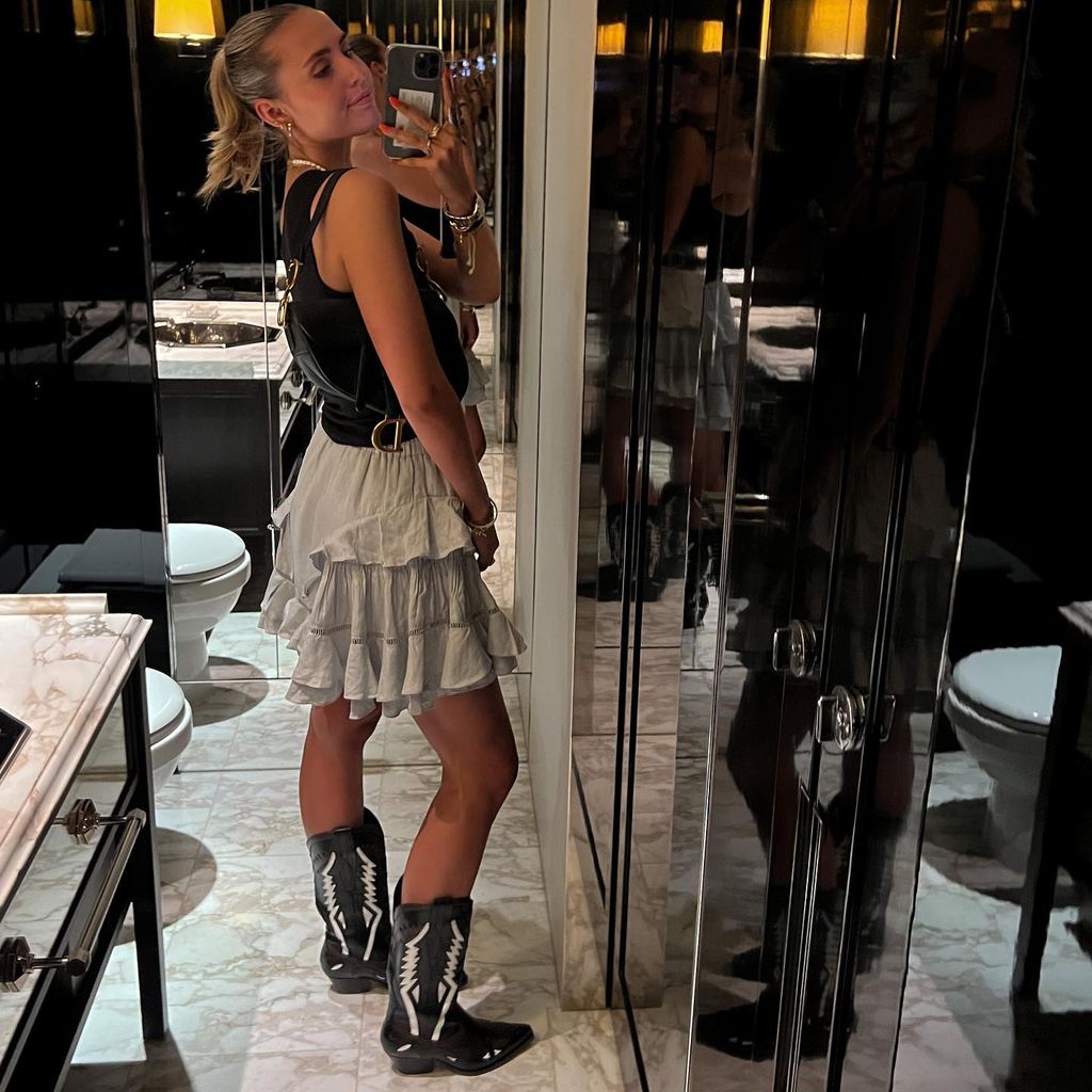 Mia southgate mirror selfie in cowboy boots