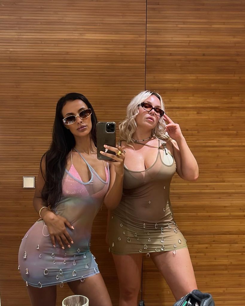 Maya matched with her friend in a sheer crystal mini dress