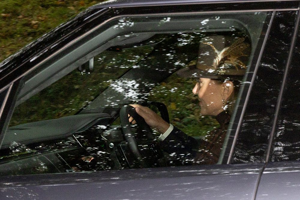 Princess Kate smiling as she drives to Crathie Kirk