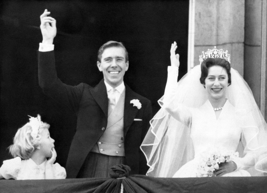 ony Armstrong-Jones and Princess Margaret waving from the balcony at Buckingham Palace on their wedding day