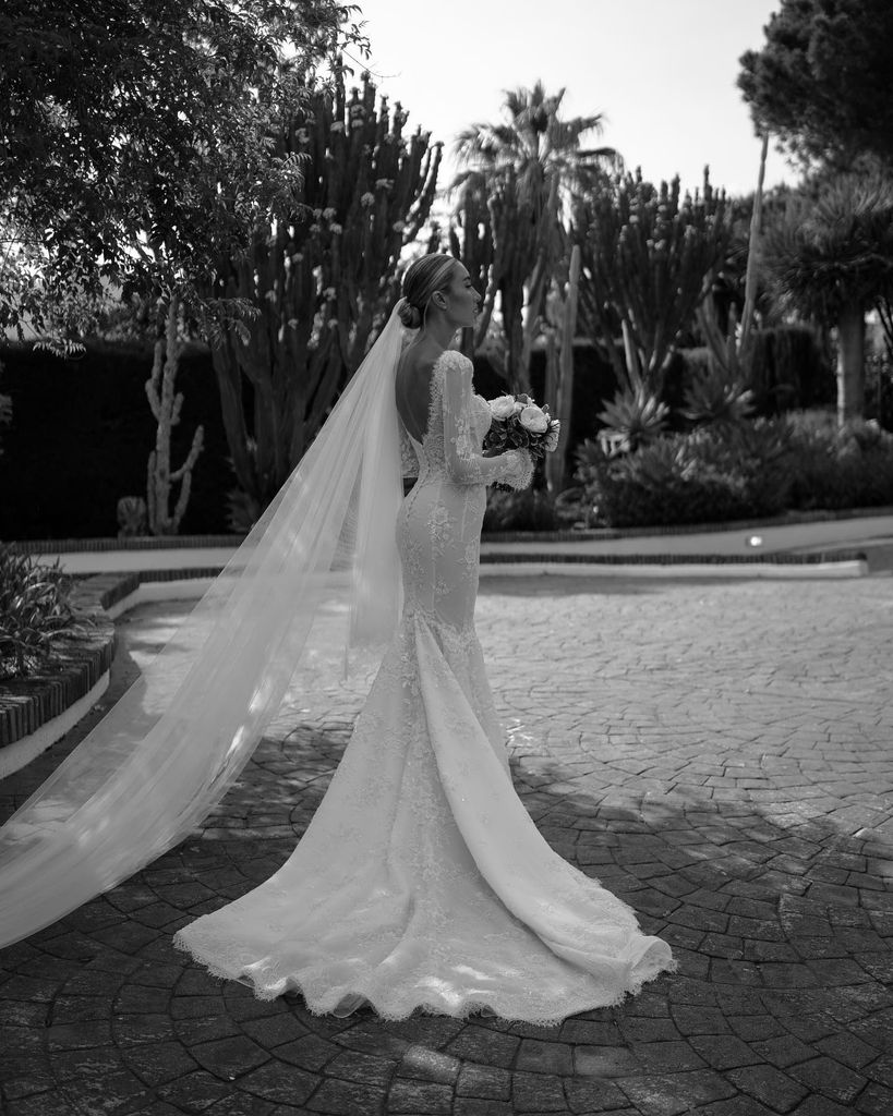 She wore a stunning lace Emma Beaumont gown for the Sotogrande ceremony