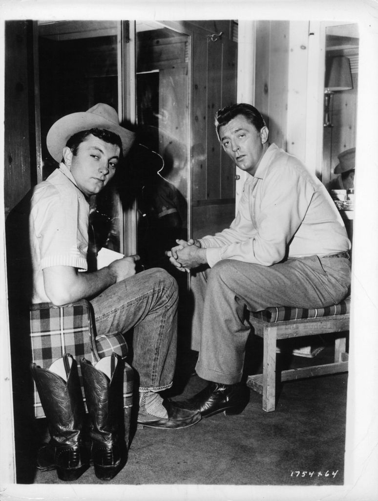 Robert and Jim Mitchum from the film 'Home From The Hill', 1960.