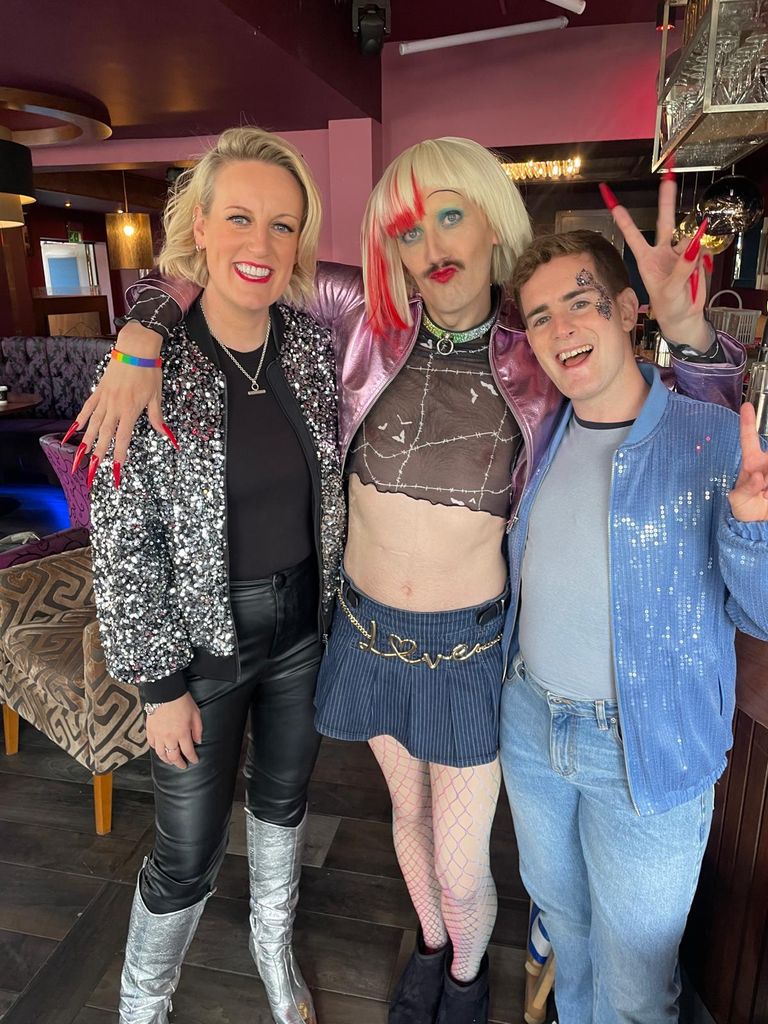 steph mcgovern posing with smoggie queens co-stars