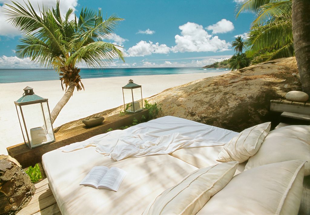 daybed on beach in seychelles