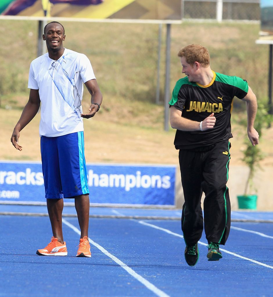 Prince Harry races Usain Bolt at the Usain Bolt Track at the University of the West Indies on March 6, 2012 in Kingston, Jamaica