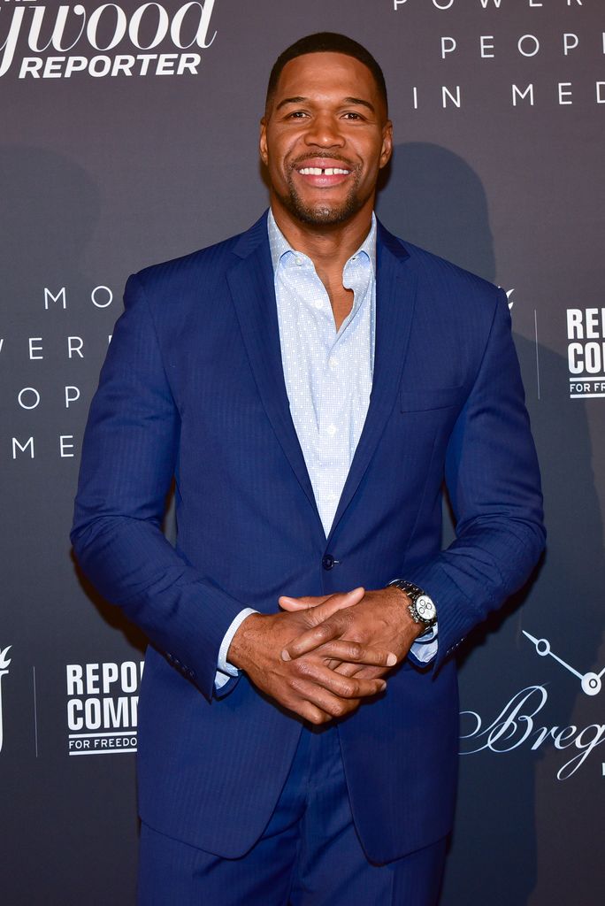 Michael Strahan in blue suit