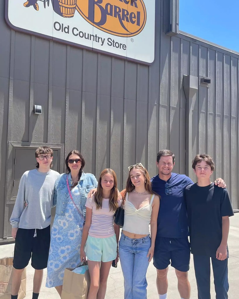 Photo shared by Rhea Durham of her with Mark Wahlberg and their four kids