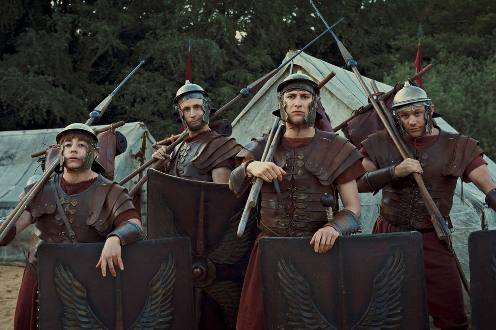 four roman soldiers in line