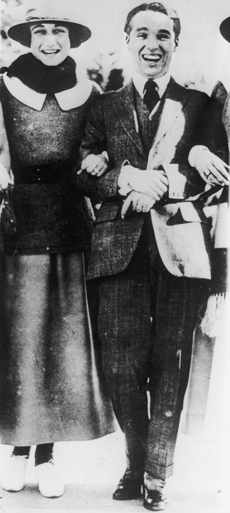Wallis Simpson and Charlie Chaplin laughing