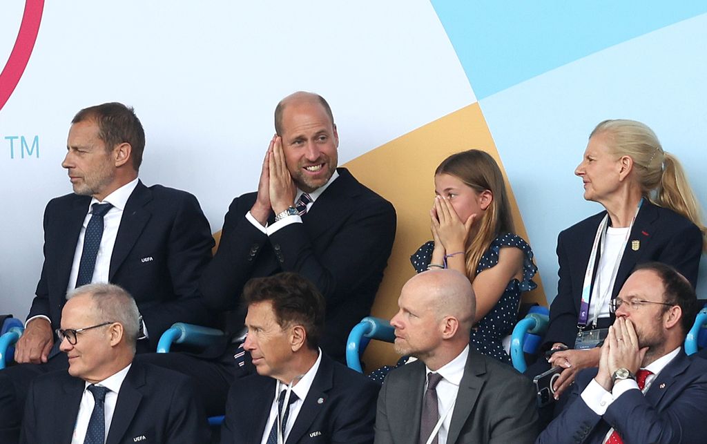 HRH Prince William, Prince Of Wales and Princess Charlotte of Wales look disappointed and dejected