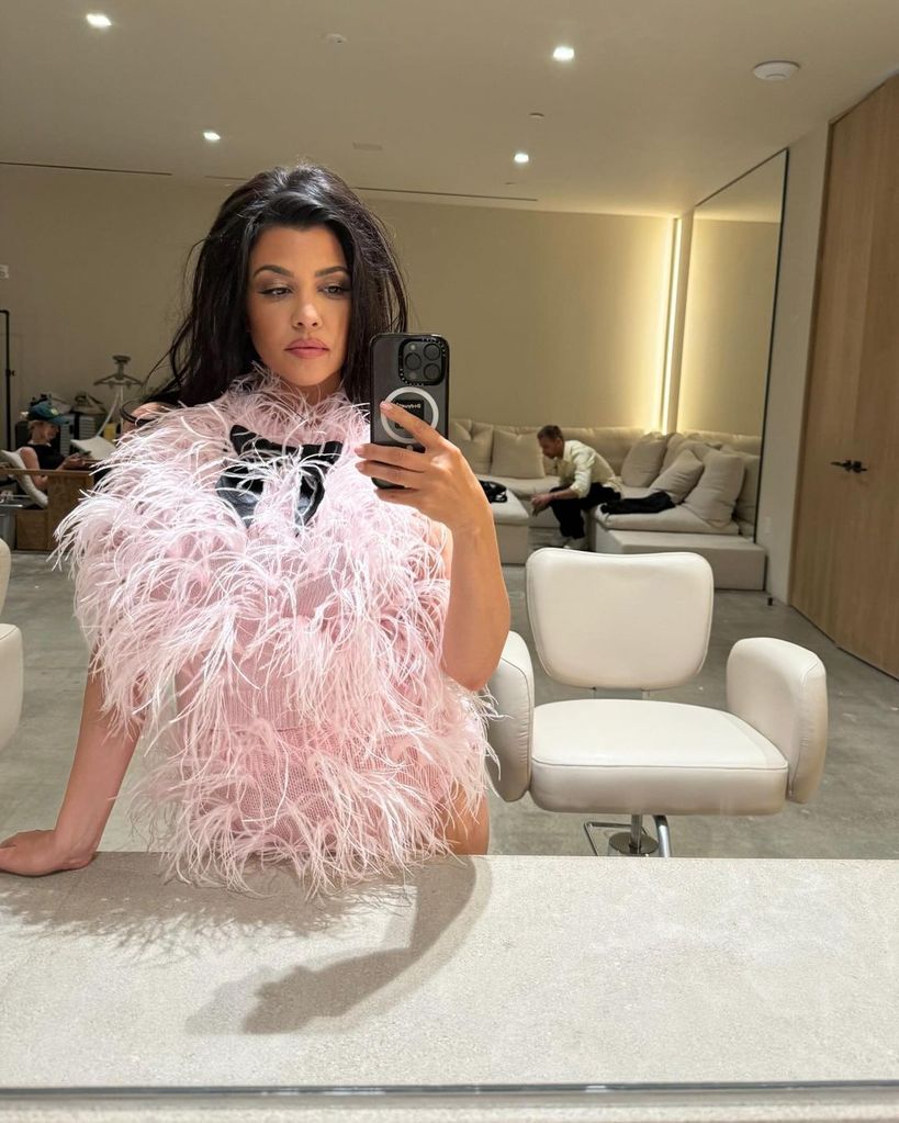 kourtney kardashian pink feathered bodysuit lemme glow lollipops