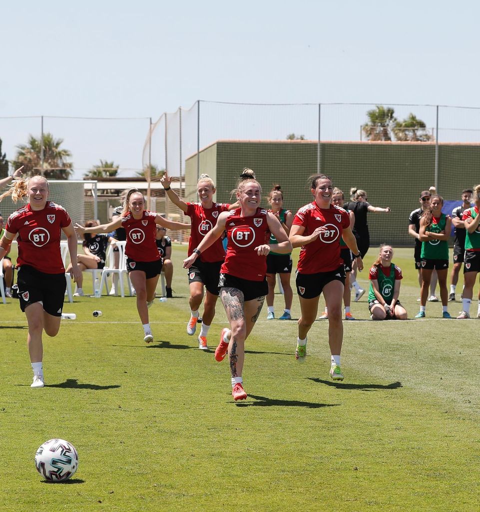 Josie on pitch with teammates