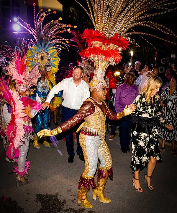 Queen Maxima dancing at a carnival in Aruba