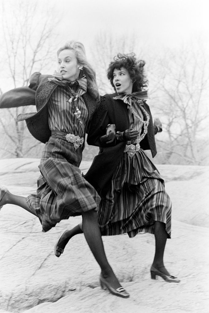 Modelling Oscar de la Renta in 1980, wearing a checked midi skirt and blazer. 