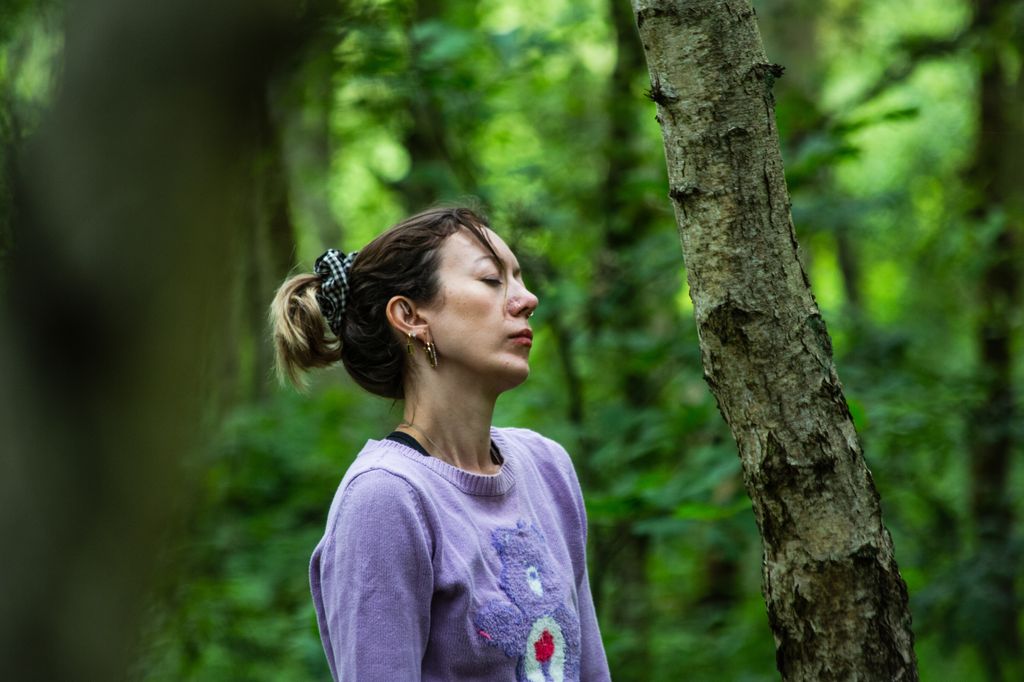 Woman forest bathing 