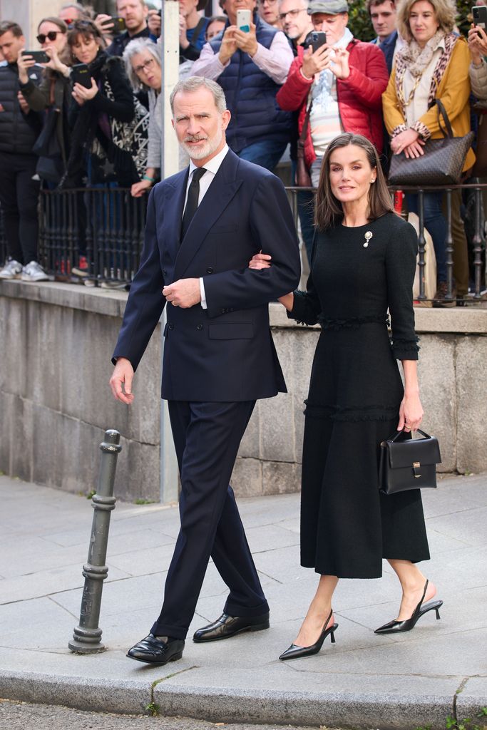 King Felipe VI of Spain and Queen Letizia of Spain arrive in black