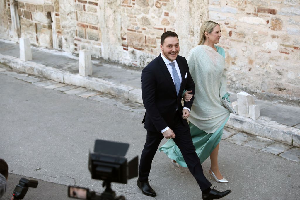 Princess Theodora of Greece and Matthew Kumar arrive for the wedding of Nikolaos De Grece with Chrysi Vardinogianni at the Church of Agios Nikolaos Rangavas in Athens,