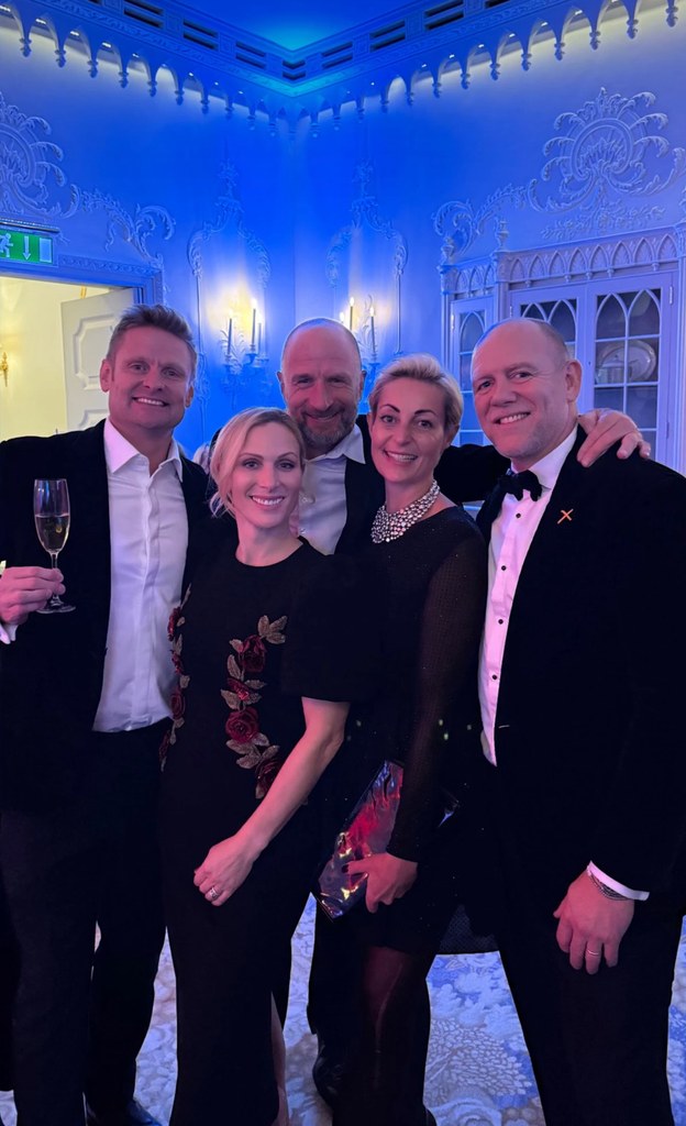 Zara and mike tindall at evening event in group photo