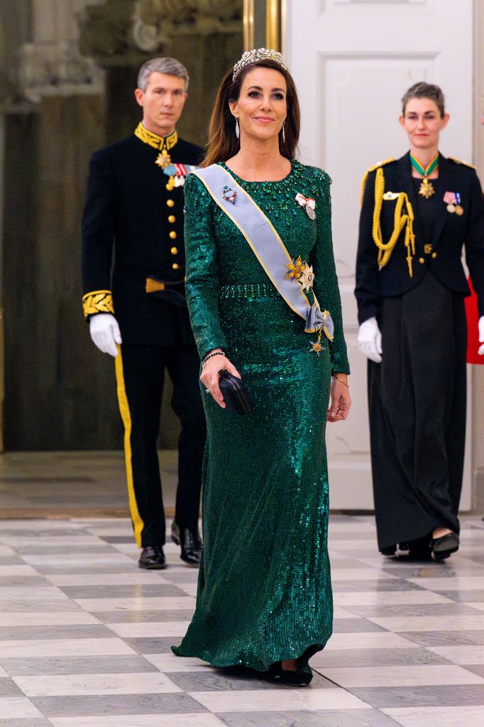 The princess looked so beautiful in the glittering green gown