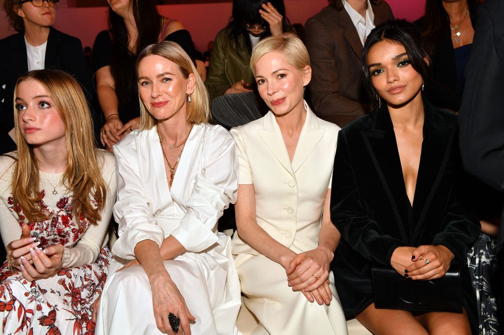 Naomi Watts (2nd L), her daughter Kai (L), US actress Michelle Williams (2nd R) and US actress Rachel Zegler attend the Dior pre-fall fashion show at the Brooklyn Museum 