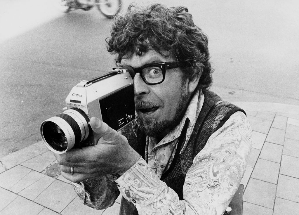 Rolf Harris with a camera
