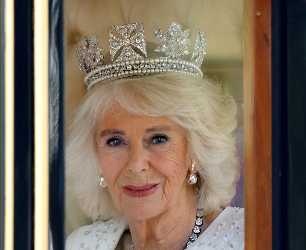 Queen Camilla riding in carriage 