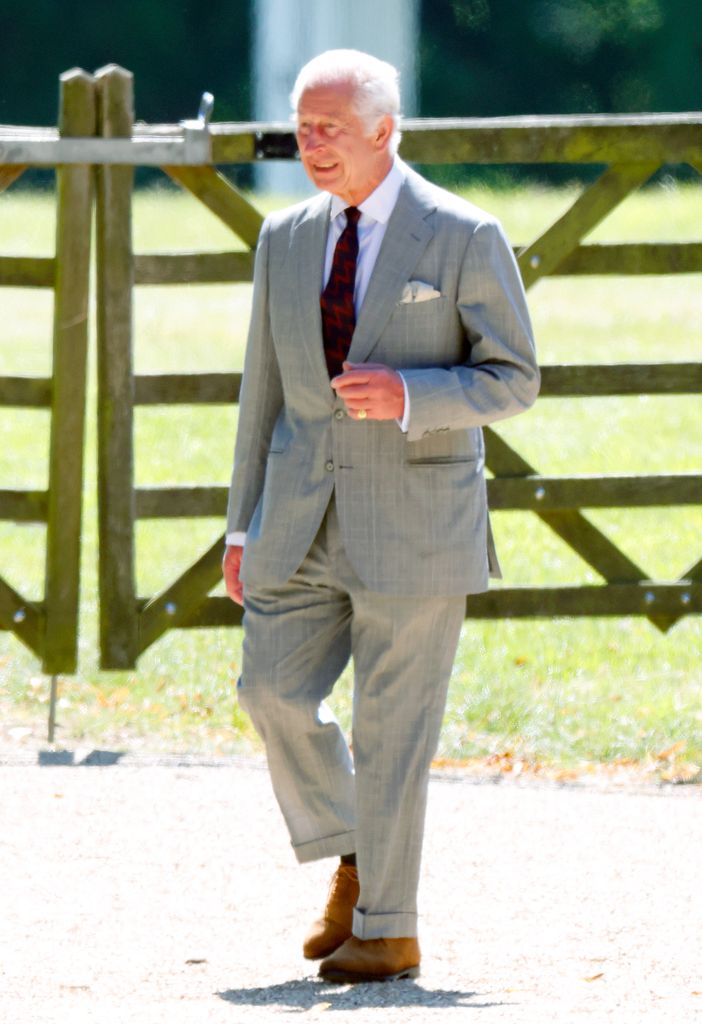 The royal looked smart in a grey suit