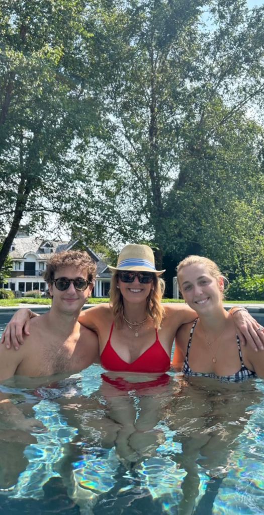 Lara Spencer poses for a photo in the pool with her children Duff and Katharine