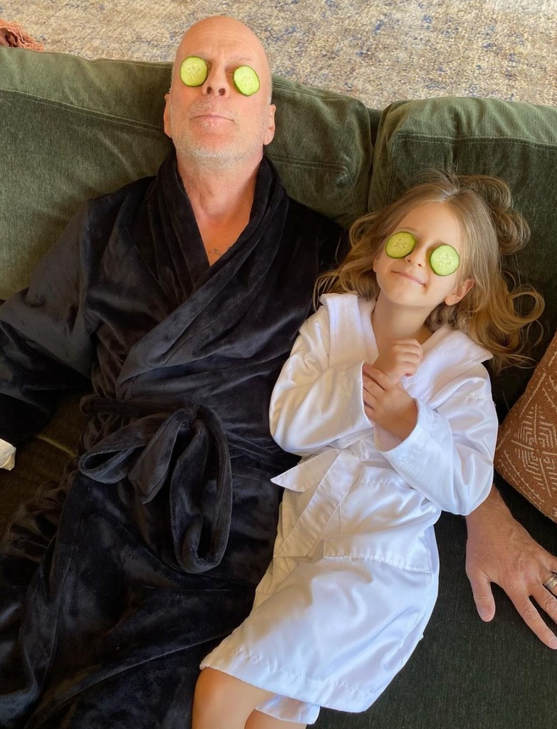Photo shared by Demi Moore and Emma Heming on Instagram on Father's Day 2024 of Bruce Willis with his daughter Evelyn