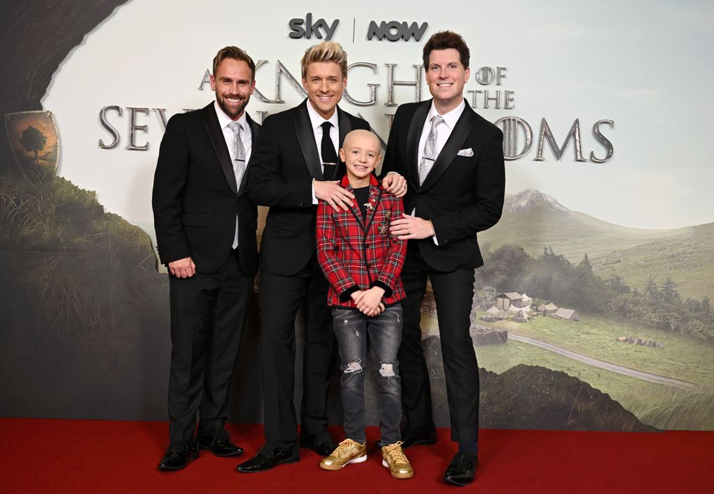 Dexter Sol Ansell with his dad and his G4 bandmates