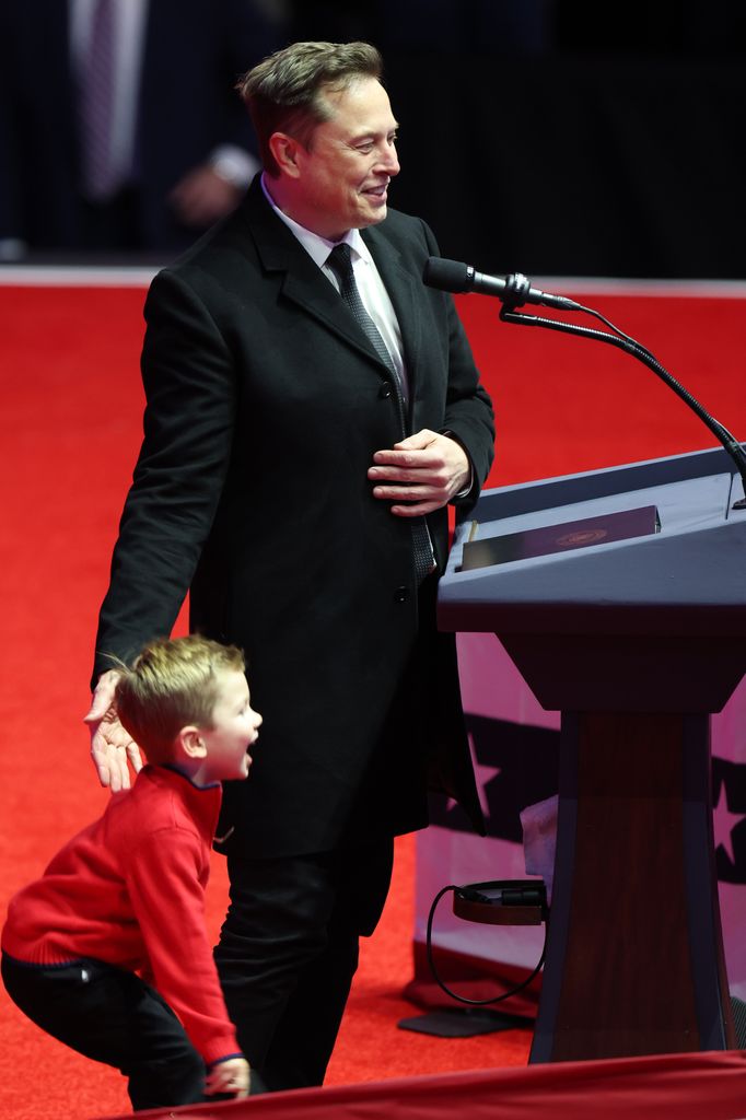 Elon Musk’s toddler son steals the show at Donald Trump’s pre-inauguration rally