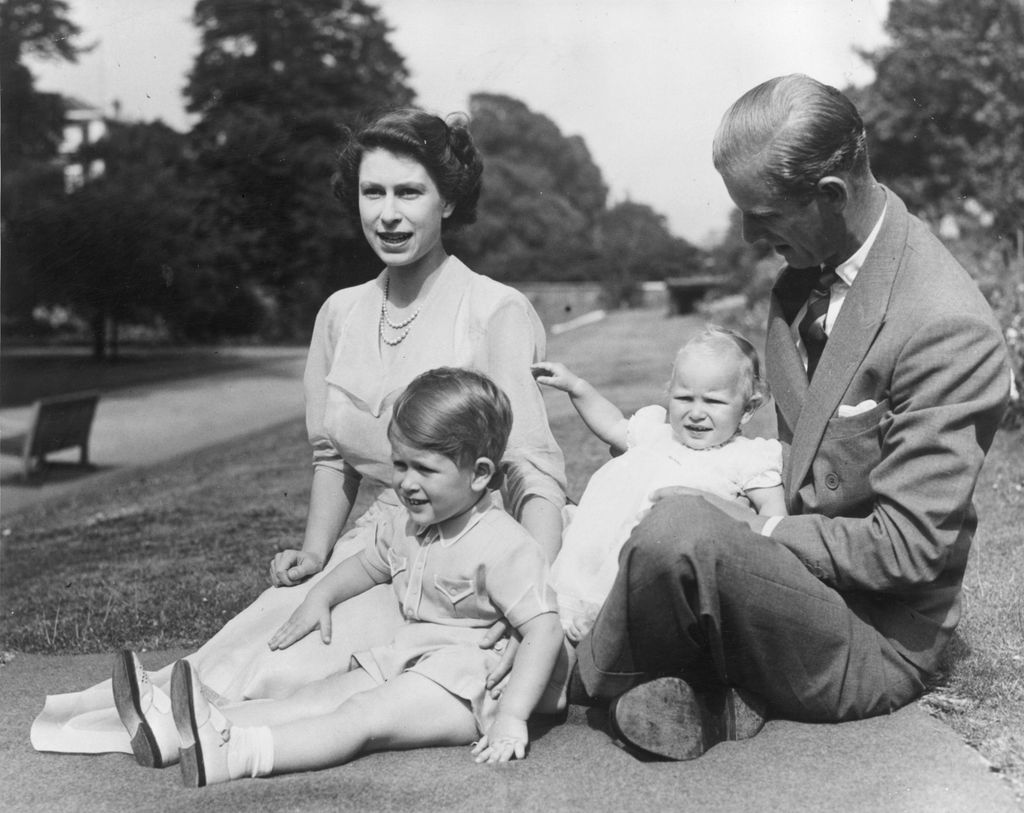 The Queen and Prince Philip sat in the gardens of Clarence House with a young Prince Charles and Princess Anne
