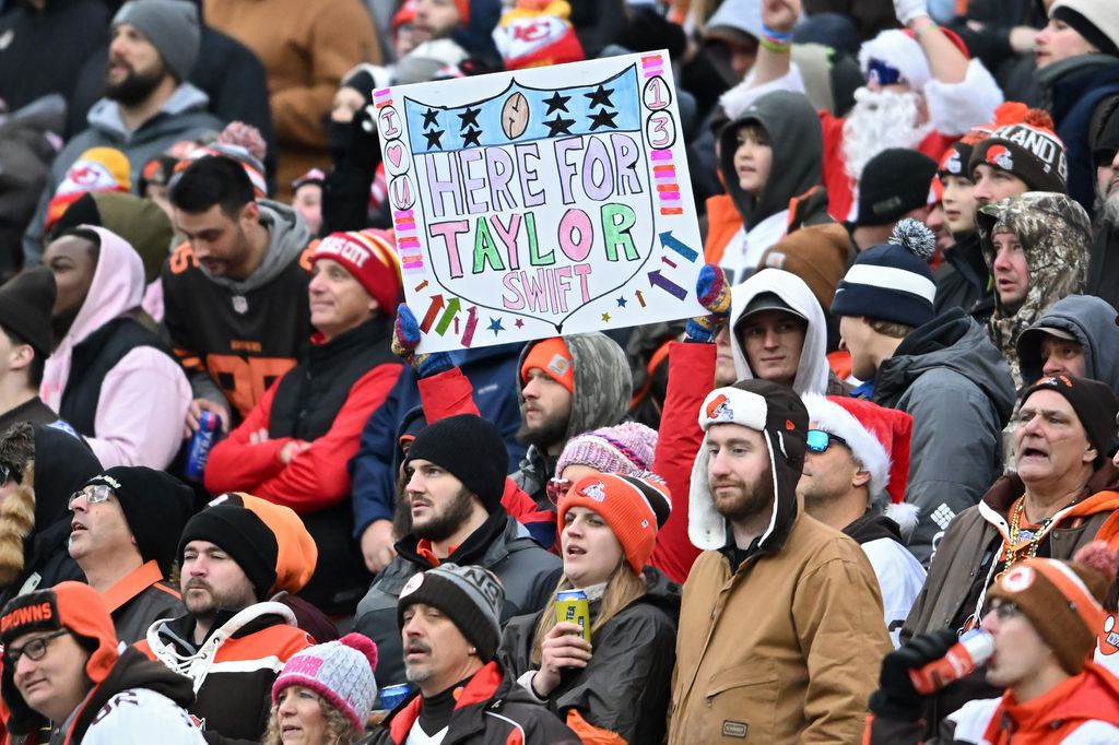 A sign that reads, "Here for Taylor Swift" is seen as the Kansas City Chiefs take on the Cleveland Browns at Huntington Bank Field on December 15, 2024 in Cleveland, Ohio.