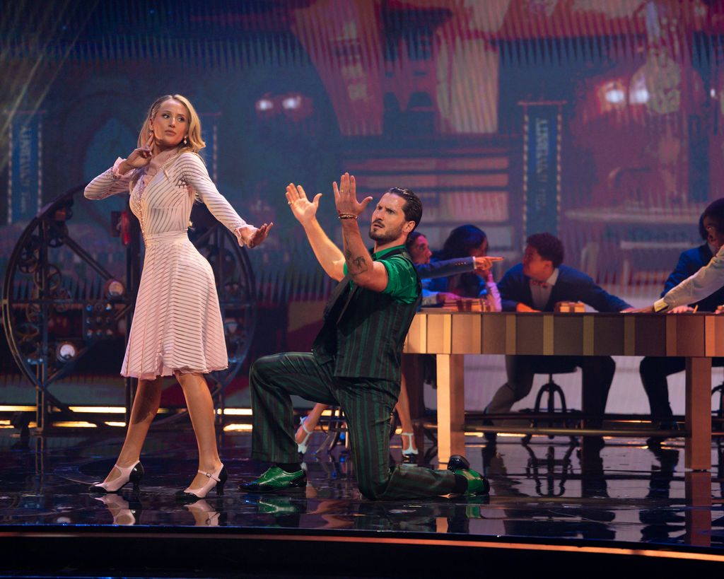 Alix Earle and Val Chmerkovskiy perform during Wicked Night on DWTS