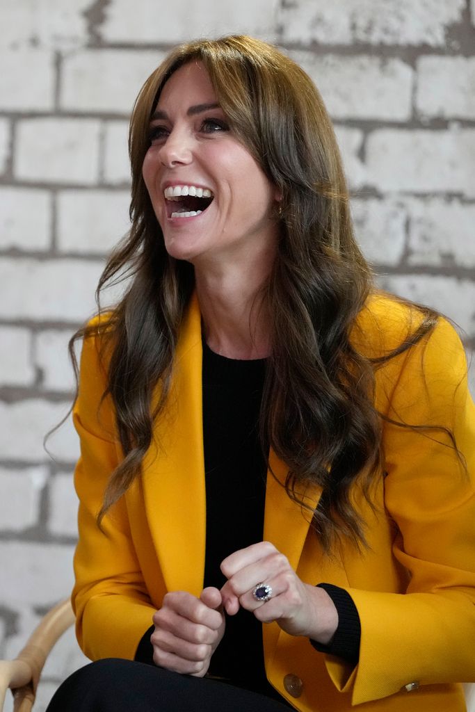 Catherine, Princess of Wales reacts as she participates in a series of workshops which focus on emotions, relationships and community action as they host a forum to mark World Mental Health Day at Factory Works on October 10, 2023 in Birmingham, England.