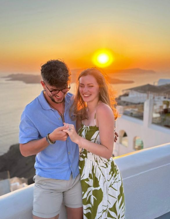 Jack Butler and his fiancee standing together in Santorini