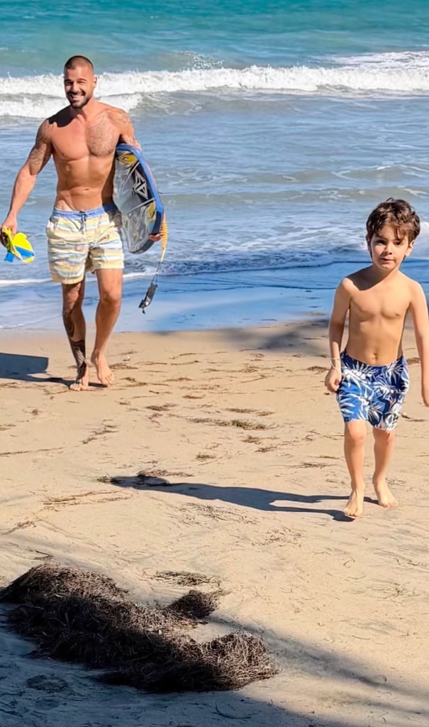 Ricky Martin and his son on the beach