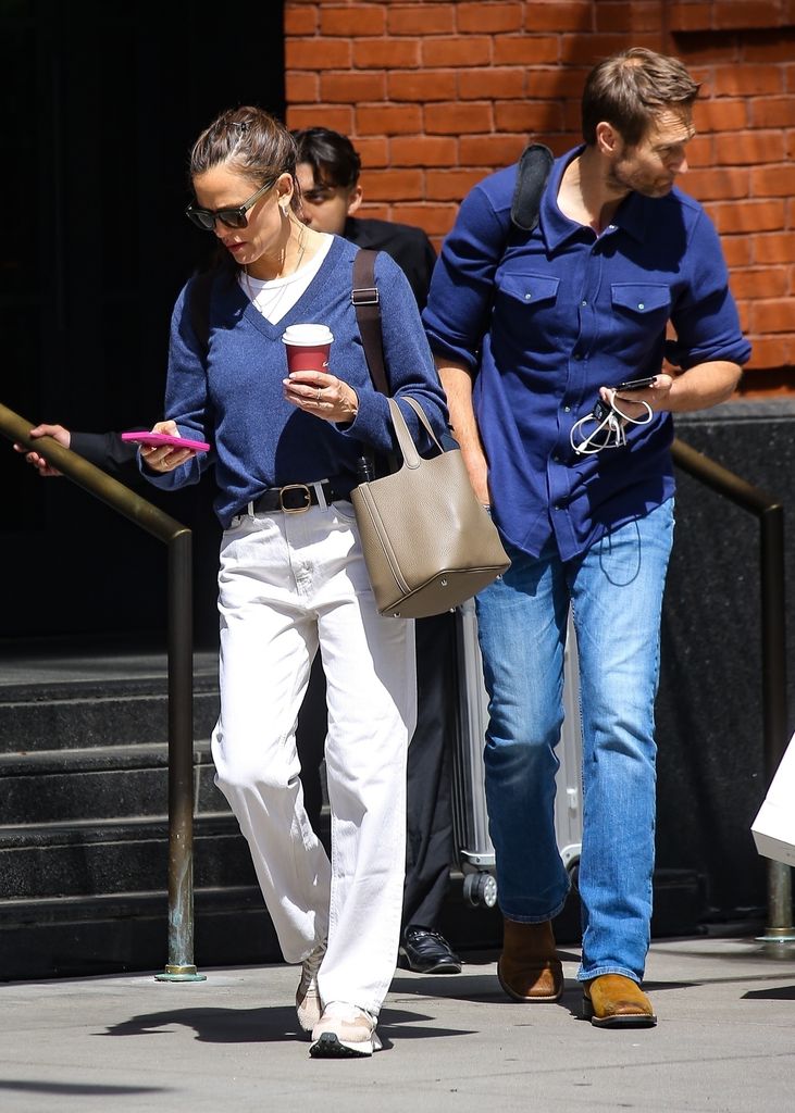 Jennifer Garner and John Miller in matching blue tops in New York