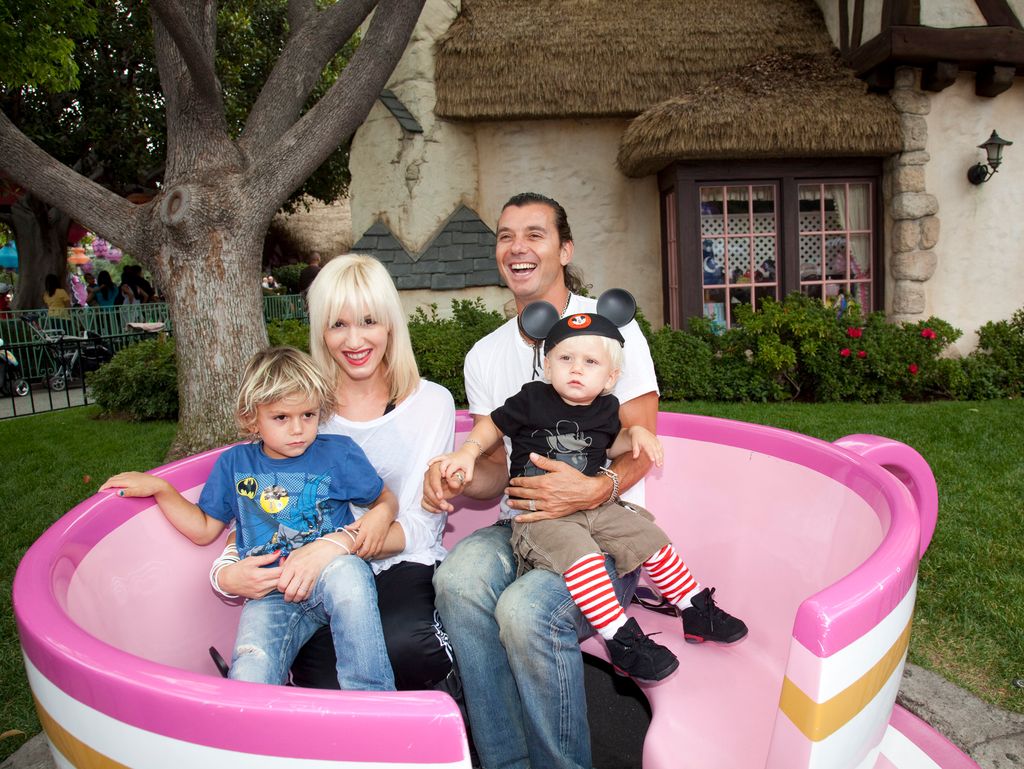 In this handout photo provided by Disney, Gwen Stefani and Gavin Rossdale, with their children, Kingston, 4, and Zuma, 1, visit the Mad Tea Party attraction at Disneyland on July 7, 2010 in Anaheim, California