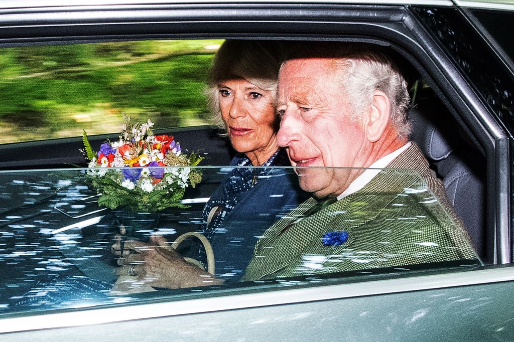 King and Queen leave church service at Crathie Kirk