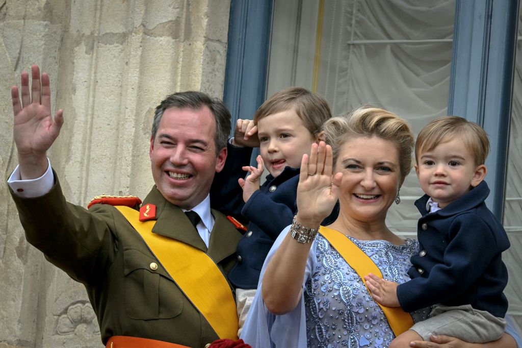 The Luxembourg royal family wave from the balcony