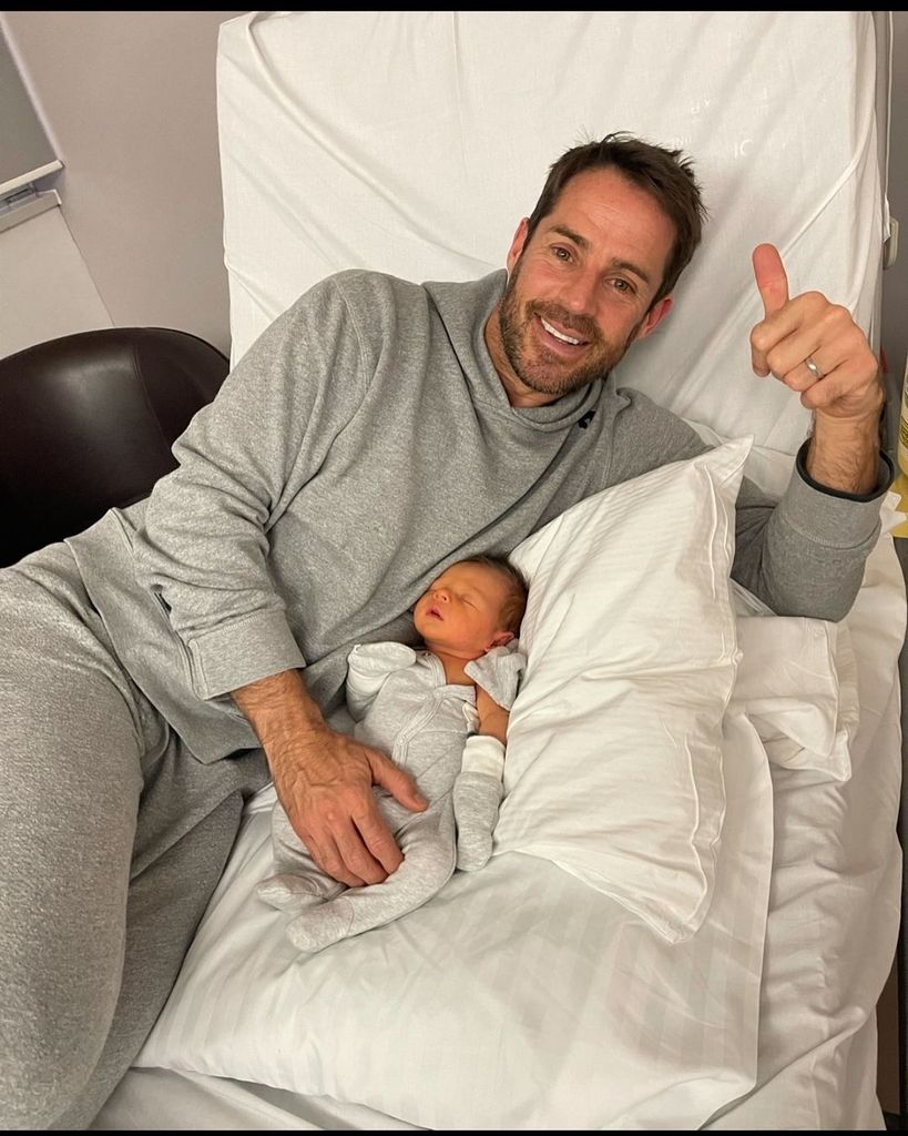 Jamie Redknapp giving a thumbs up next to his newborn son Raphael