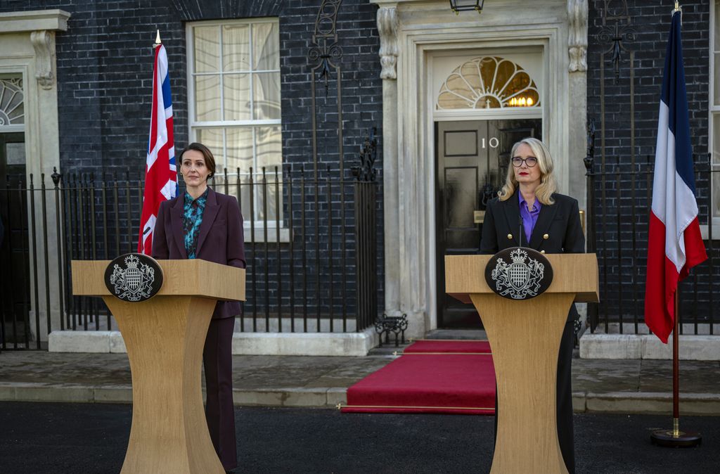 two political leaders standing behind podiums outside No 10 Downing Street