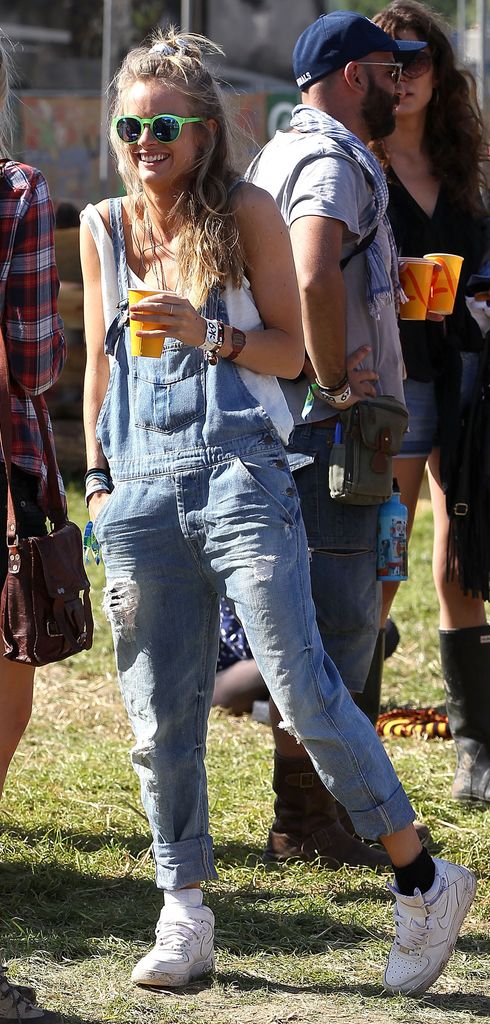Prince Harry's girlfriend Cressida Bonas in denim overalls at Glastonbury
