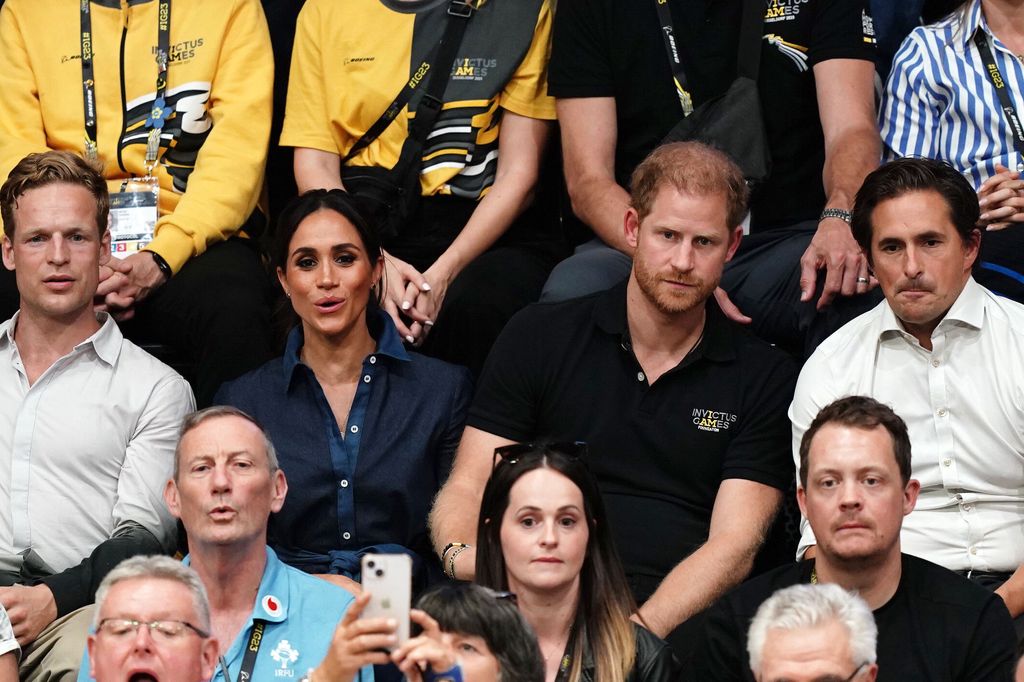 meghan and harry with nicky scott and john mercer at invictus game
