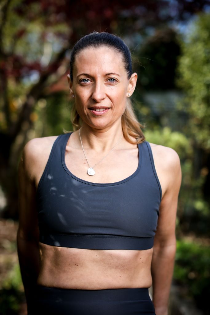 Woman in activewear looking at the camera