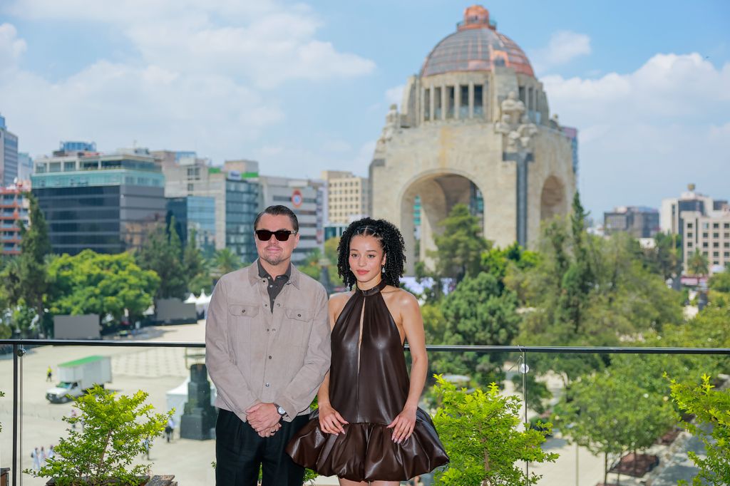 Leonardo DiCaprio and Chase Infiniti pose during the photocall for the movie 'One Battle After Another'