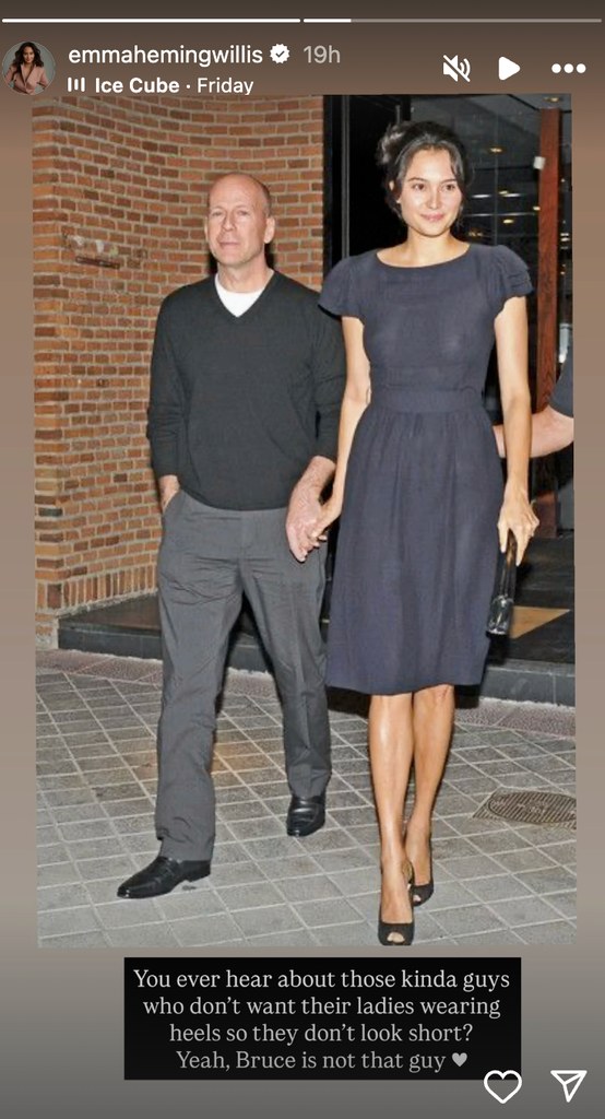 Emma in black dress and Bruce in black sweater