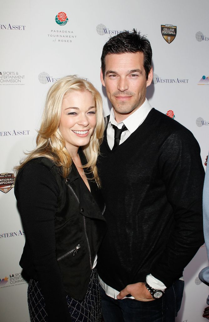 LeAnn Rimes and Eddie Cibrian in black outfits